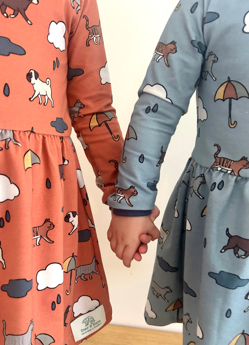 Orange Raining Cats & Dogs Baby and Children's Dress