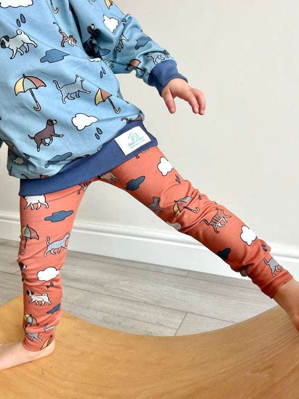 Orange Raining Cats & Dogs Baby and Children's Leggings