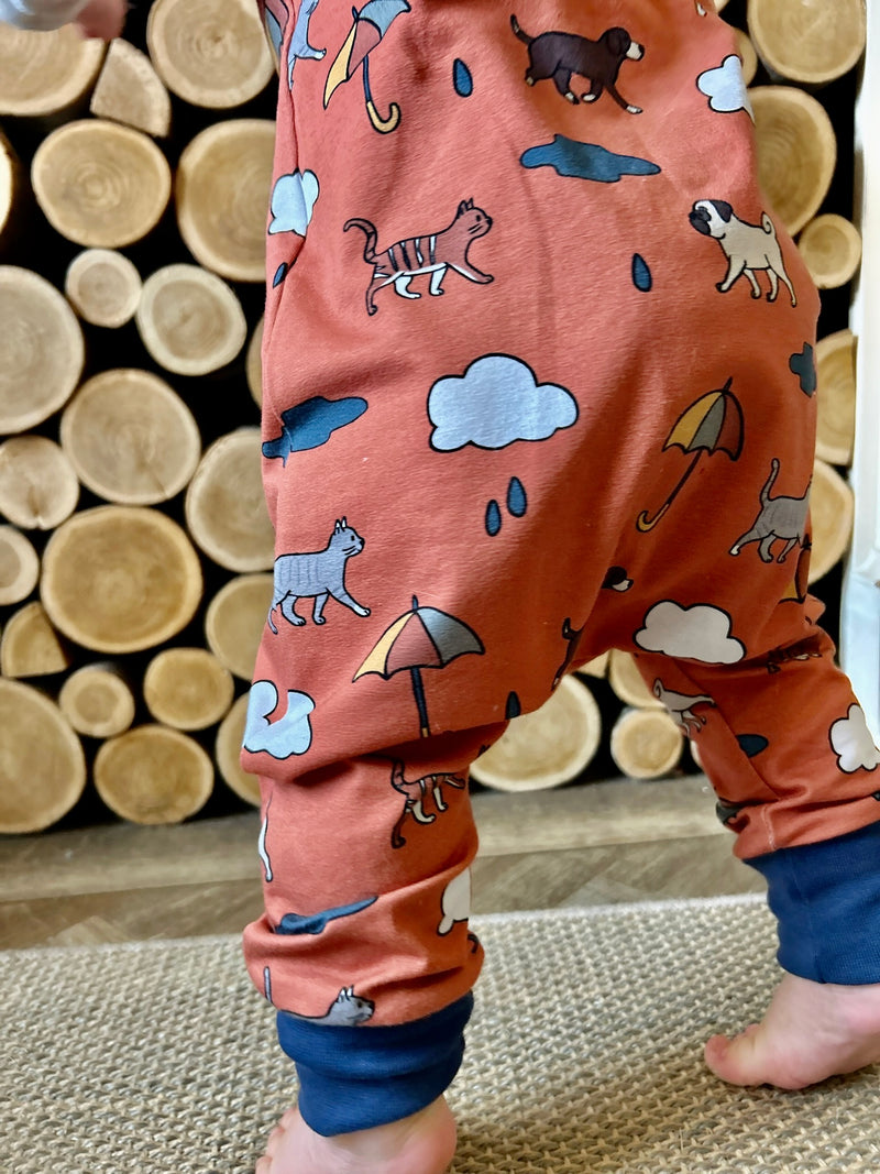 Orange Raining Cats & Dogs Baby and Children's Romper