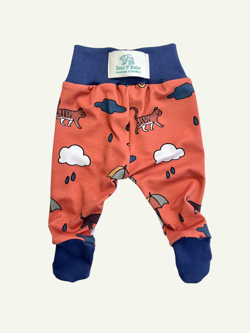 Orange Raining Cats & Dogs Baby and Children's Footed Leggings