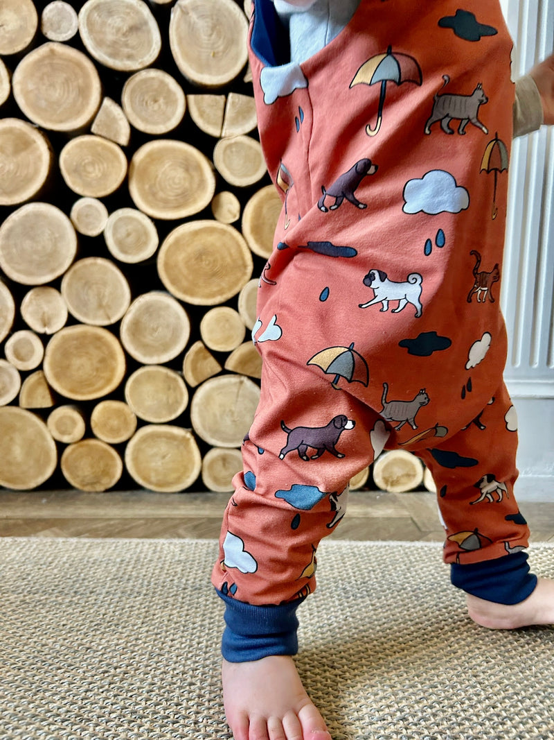 Orange Raining Cats & Dogs Baby and Children's Romper